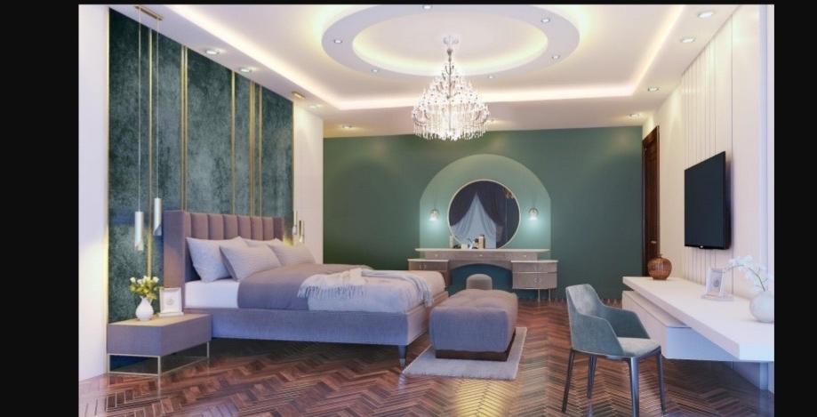 Bedroom with circular feature wall and gypsum ceiling