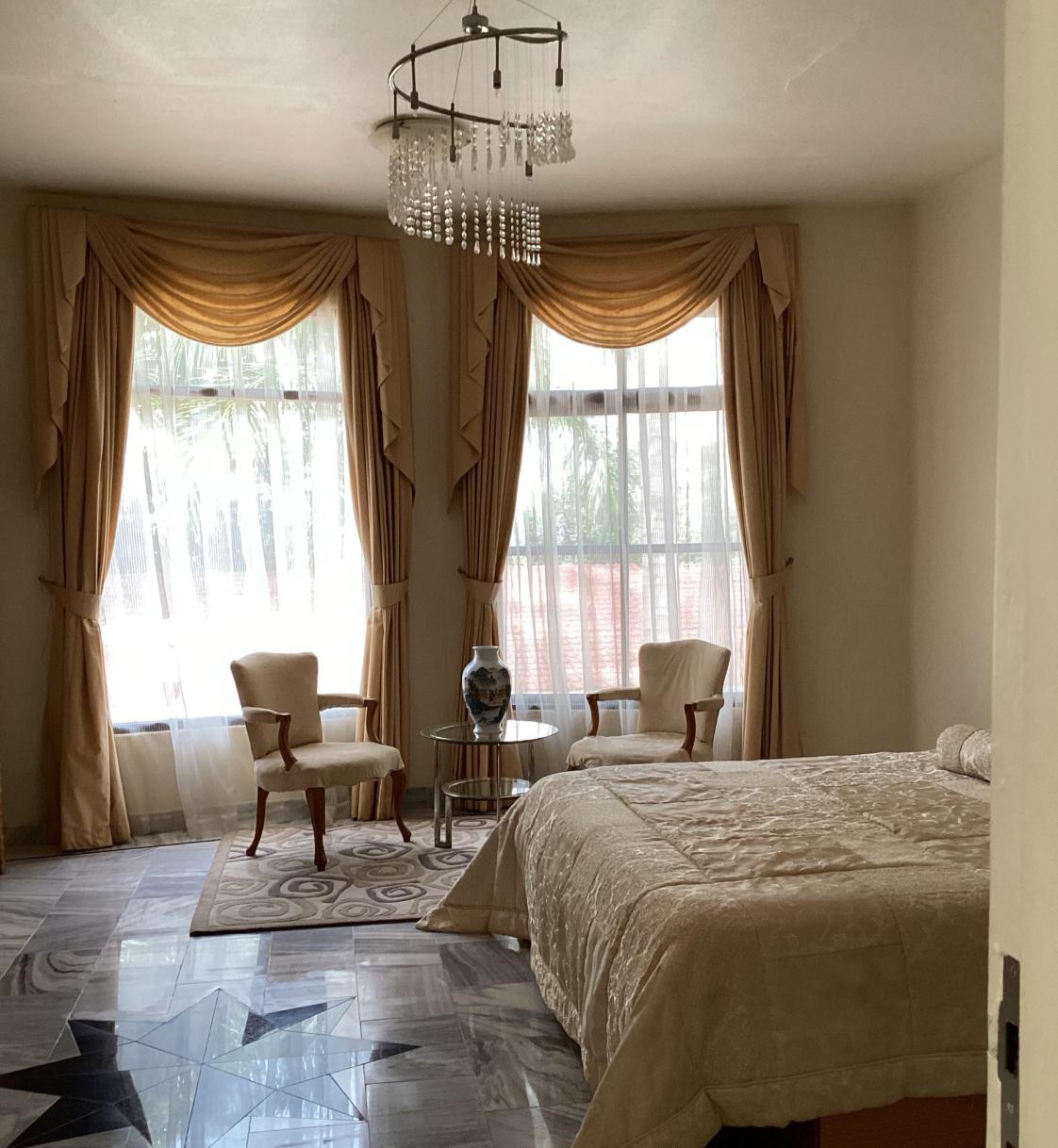 Classic bedroom with warm curtains