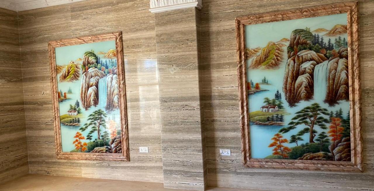 Decorative stone walls with inset artwork